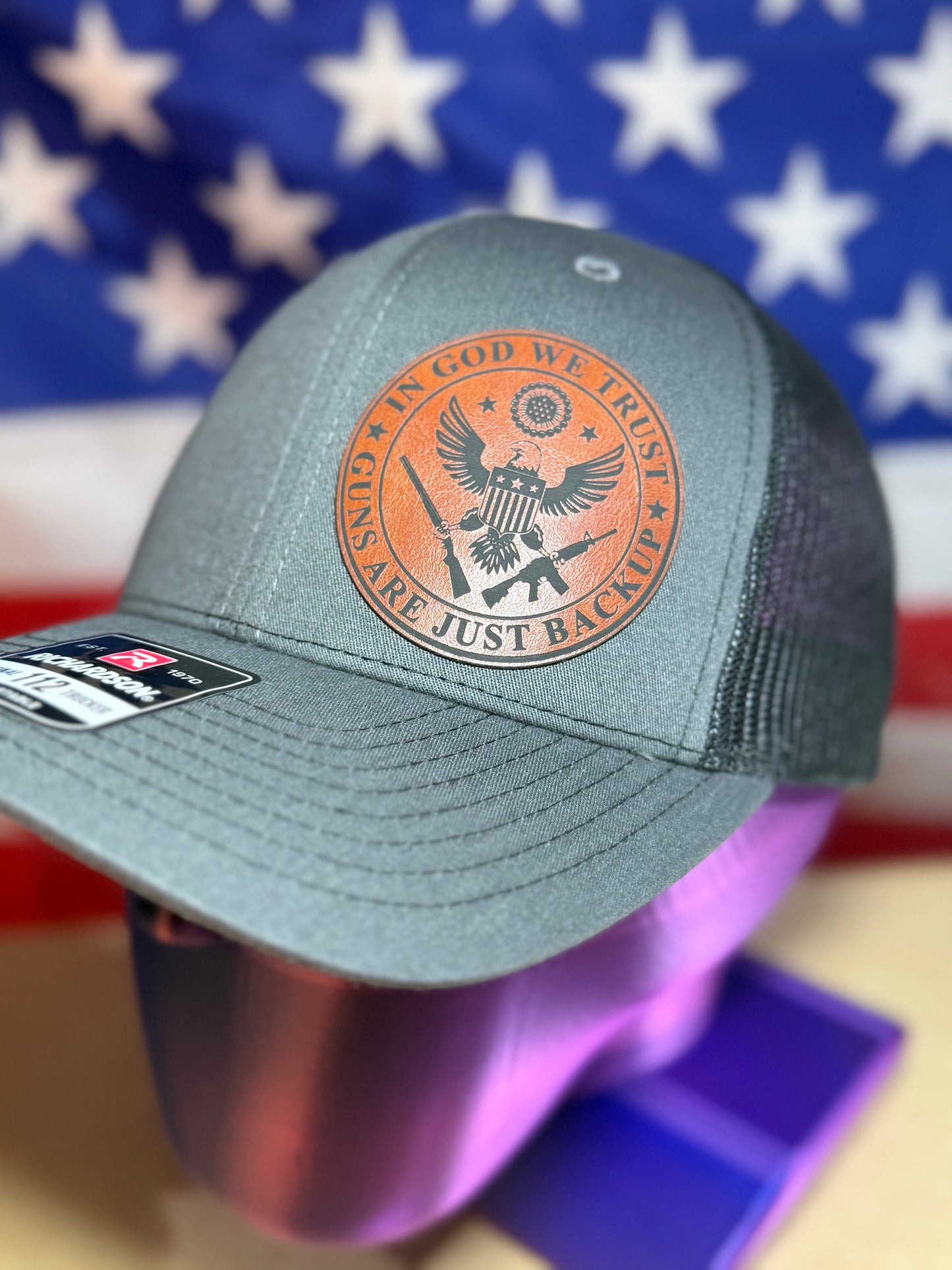 IN GOD WE TRUST, GUNS ARE JUST BACK UP