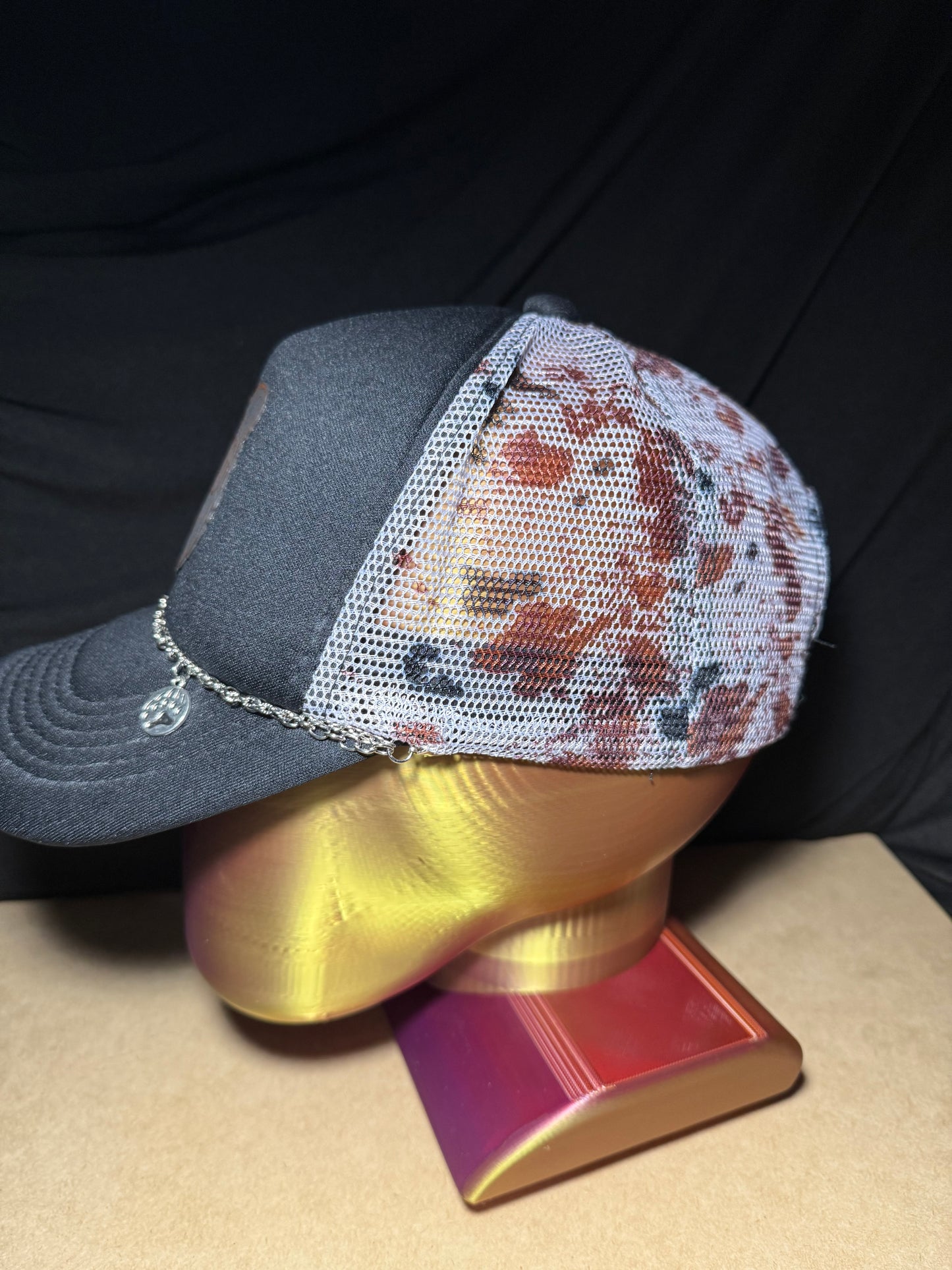 Mama Bear Patch trucker hat with chain and charms.