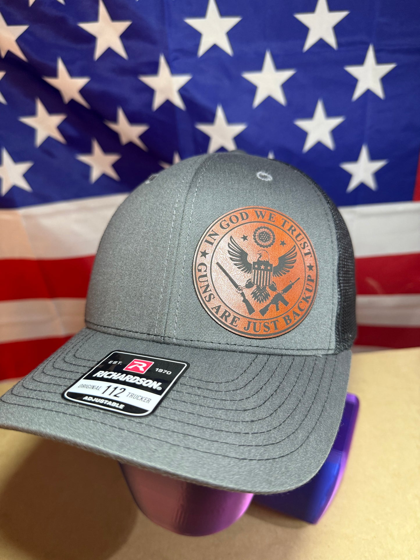 IN GOD WE TRUST, GUNS ARE JUST BACK UP