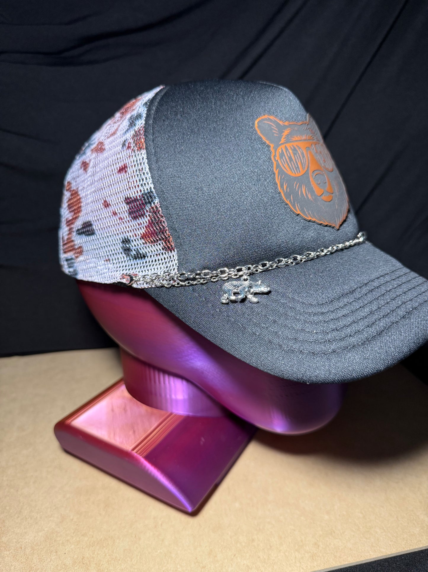 Mama Bear Patch trucker hat with chain and charms.